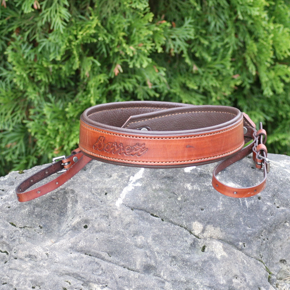 camera sling embossed with the customers name